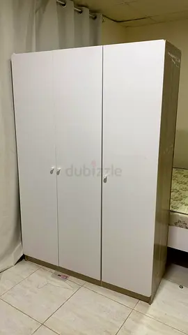 IKEA-style 3-door white wardrobe in good condition