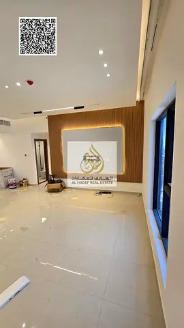 Three-bedroom apartment with a living room, maid's room, and parking available for annual rent in Al Rashidiya 1. Super deluxe finishing.