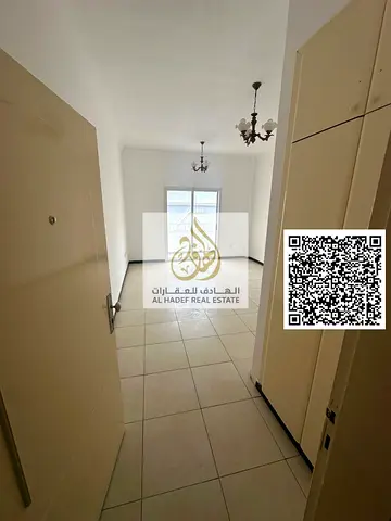 For rent in Ajman Al Nuaimiya 2, 1-bedroom apartment with balcony, 1 bathroom, central AC, near Istanbul Market on King Faisal St, 4 payments, AED 27,