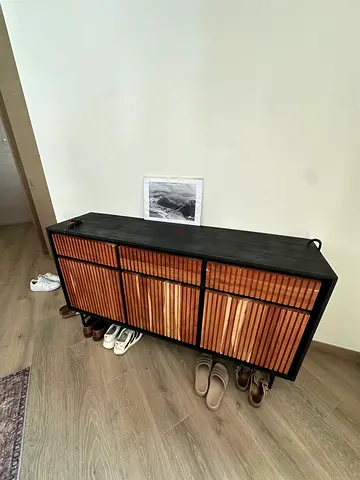 Low Wooden Shoe Cabinet with Slatted Doors — Black Frame, Natural Wood Panels