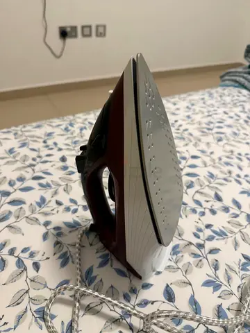 Used Steam Iron in Good Working Condition