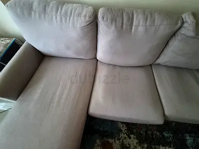 Light grey L-shaped fabric sofa - good condition