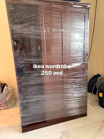 Ikea PAX-style Wardrobe — Dark Wood, Good Condition (250 AED)