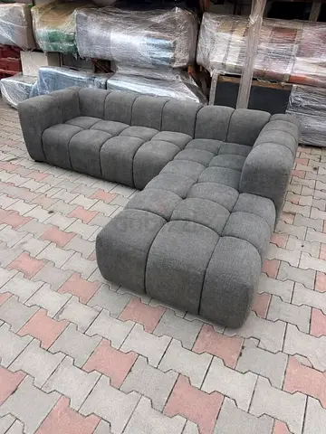 L-shaped tufted grey fabric sectional sofa - comfortable modern design