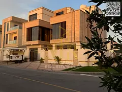 Corner villa with private pool and elevator in one of Ajman's most prestigious areas, on a main 