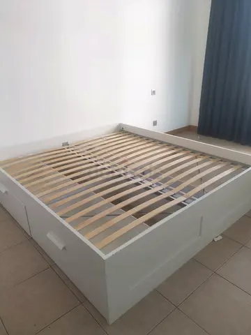 IKEA king size bed with 4 storage drawers and mattress for sale