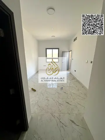 One bedroom, living room, balcony, two bathrooms, kitchen, and built-in wardrobes. First occupancy.