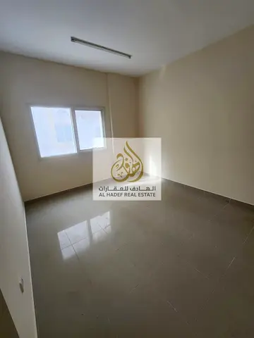 Two bedroom apartment for rent in Sharjah Al Butina with practical layout comfortable spaces and prime location close to essential services