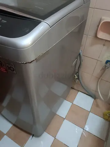 16kg lg Top-load washing machine - good working condition, minor exterior dent