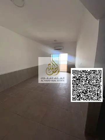 For rent in Ajman, a two-bedroom apartment with a living room in Al Rawda 2, behind Layali Beirut. Very spacious with a balcony and three bathrooms. R