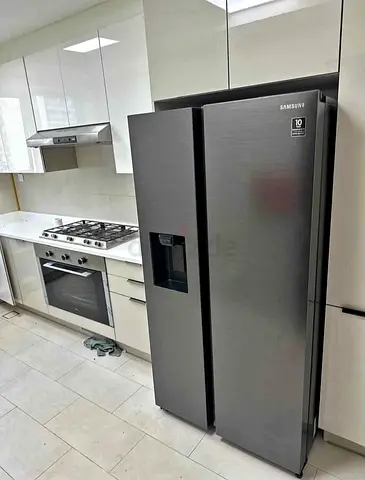 Samsung side by side Refrigerator with water dispenser and ice maker