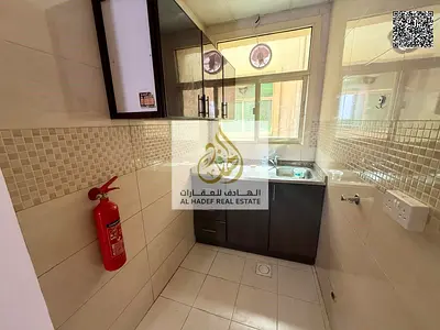 استوديو واسع للإيجار في الروضة 3 | مطبخ منفصل | شارع عمار | 19,000 درهم