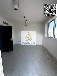 One bedroom, living room, balcony, two bathrooms, and kitchen. Main street, prime location in Al-Jar