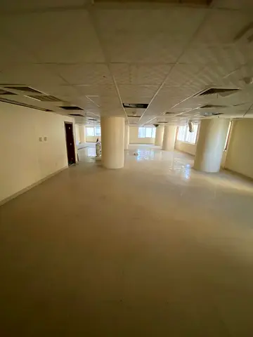 Commercial office for annual rent in Al Majaz 2, with a side view of the lake and Al Majaz Park. The office is 2800 sq ft and suitable for all purpose