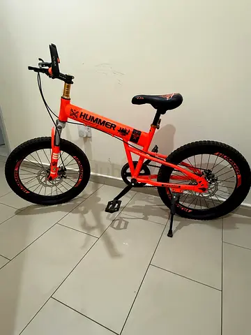 Orange Hummer kids/balance bicycle - good condition