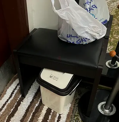Small black ottoman bench
