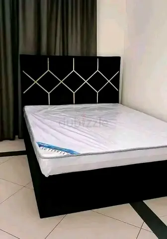 Black Upholstered Bed Frame with Diamond-Pattern Headboard - Single/Double (confirm size)