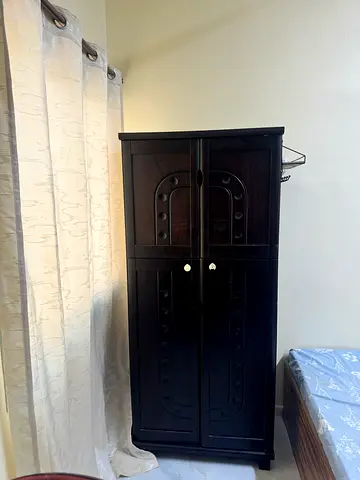 Two-Door Wooden Cupboard for Sale – Good Condition