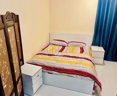 White double bed with storage and matching bedside table - good condition