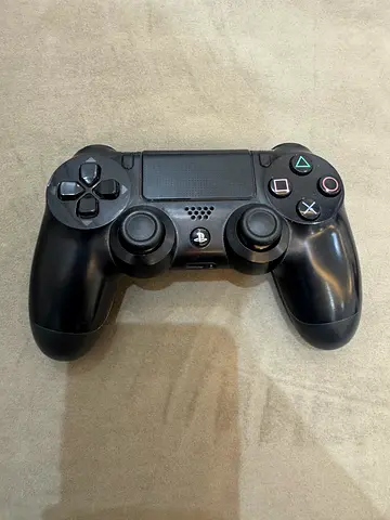 Used Sony DualShock 4 Controller - Black (Good Working Condition)