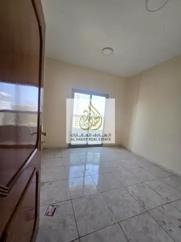 🏡✨ شقة غرفتين وصالة للإيجار السنوي في النعيمية 1 – موقع مميز قريب من مدرسة الحكمة وشارع الكويت وجسر غلفا، تكييف مركزي وبلكونة