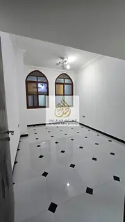 Al Rawda 3, near Khartoum Street, close to the Dubai and Sharjah exit - 2 bedrooms, living room, 2 b