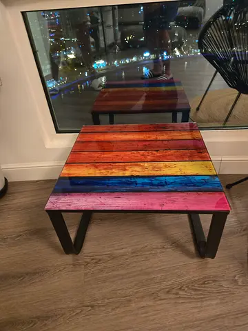 Small colorful glass side table with metal legs