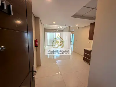 Emirates City - Brand new tower, first occupancy, 2 bedrooms, living room, 2 bathrooms, 2 balconies, open view, gym and swimming pool inside the tower
