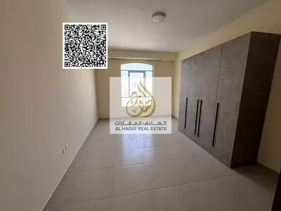 Two bedrooms and a living room, first occupancy, with built-in wardrobes and parking on Ajman Corniche