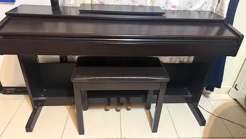 Yamaha piano with stool in immaculate condition