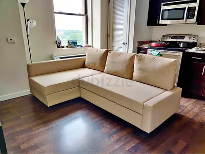 Ikea Beige FRIHETEN corner sofa bed / L-shaped sofa