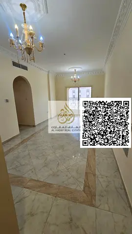 Three-bedroom apartment with a living room for rent in Al Hamidiya, Ajman, featuring three bathrooms, a balcony, built-in wardrobes, close to the univ