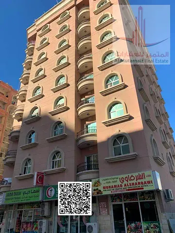 استوديو للإيجار في الراشدية عجمان بمساحة كبيرة وتشطيب سوبر لوكس وإطلالة مباشرة على شارع عبدالله بن عبود بالقرب من جراند مول وأبراج عجمان