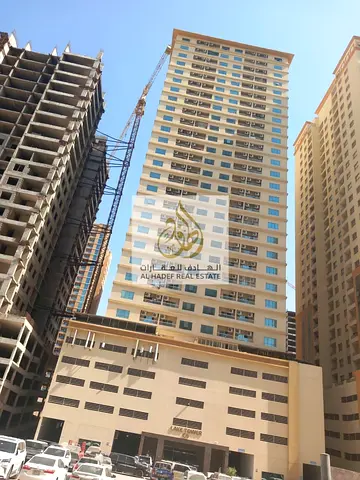 A great opportunity to own a property in Ajman, located in Al Amerah within Emirates City, specifically in Lake Tower C. This well-designed apartment