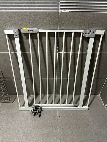 Pressure-mounted baby safety gate — white metal, couple of extensions free along with it