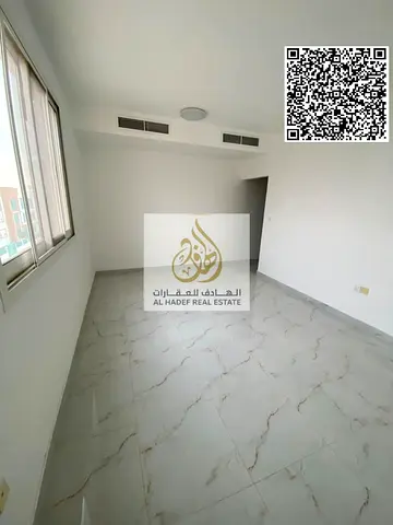 One-bedroom apartment for annual rent, second occupant, Al-Jarf 3 area. Two bathrooms, master bedroom with balcony. Price: 32,000 EGP payable in 4 or