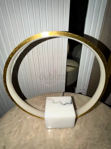 Modern Circular Halo Table Lamp with Marble Base bought at 3200 aed .