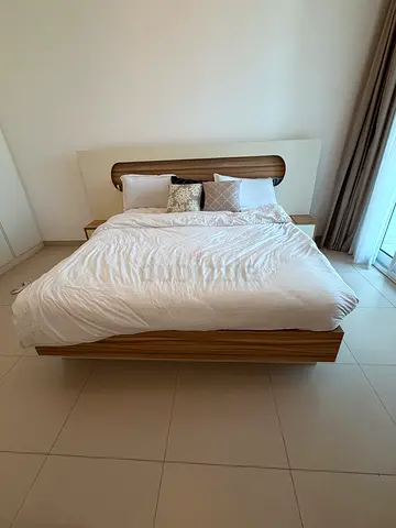 Modern wooden platform double bed with headboard