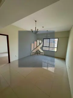 A one-bedroom apartment with a living room in a strategic location in the Al Taawun area, directly o