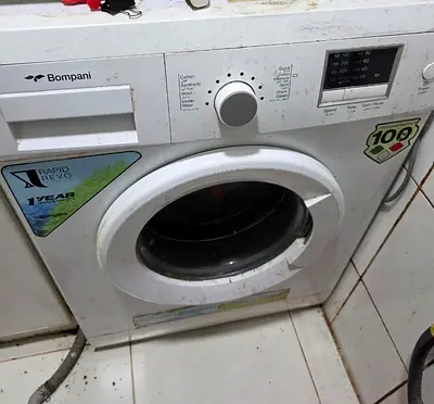 Used front-load Bompani washing machine - needs cleaning, works
