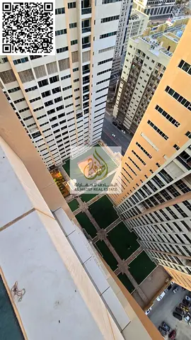 Two bedrooms, a living room, three bathrooms, a balcony, very spacious areas in Ajman One Towers, with a laundry room.