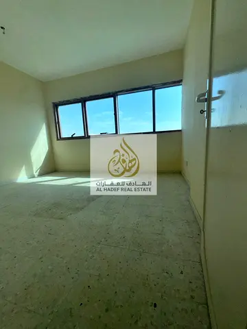 Annual Rental Apartment in Sharjah Al Majaz 2 Sharing Contract Two Bedroom Hall on Jamal Abdul Nasser Street Free Maintenance AC on Landlord 3 Elevato