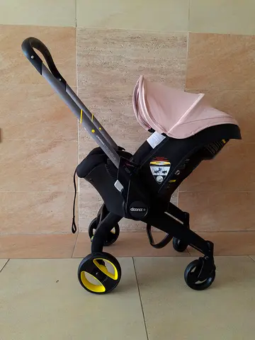 Doona+ Baby Car Seat and Travel Stroller, Convertible 0+ Infant Car Seat and Pram Combo- SAHARA SAND