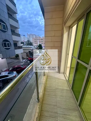 Two-bedroom apartment with a living hall for annual rent in Al Rashidiya 2, Ajman, located in a convenient and lively area close to all essential serv