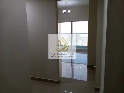 Annual rent in Ajman, Al Amrah area. Two-bedroom apartment with a living room, balcony, central air conditioning, and parking. Located in Tower 2. Sep
