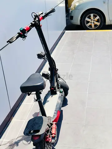 Electric scooter with seat - used, working condition