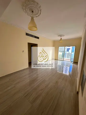 A room and a hall, second floor, for annual rent, Al Rashidiya 3