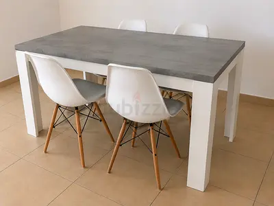Modern Concrete-Top Dining Table with 4 Chairs - AED 300