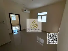One bedroom and living room, first occupancy, Al Alia area, 30,000 AED, directly on Mohammed Bin Zay
