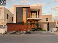 Luxury villa for sale in Al Bahia – Ajman | Two floors + roof | 3,014 sq ft | 4 master bedrooms | 
